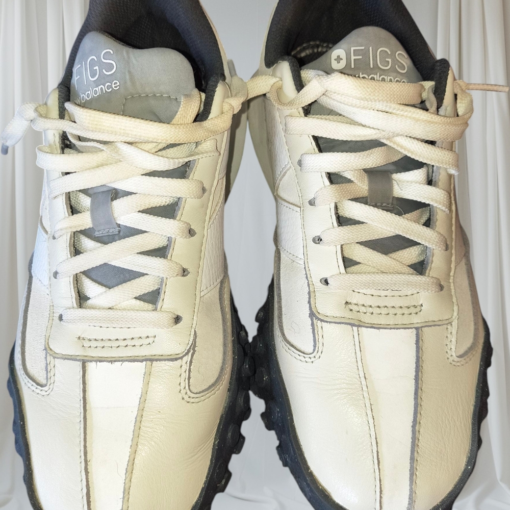 New Balance Cream and Black Sneakers